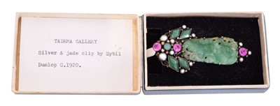 Lot 8 - A jade and gem-set silver clip brooch attributed to Dorrie Nossiter