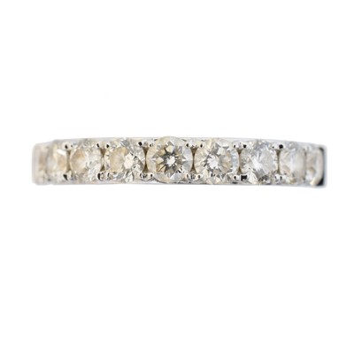 Lot 127 - An 18ct gold diamond half eternity ring