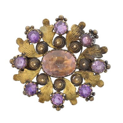 Lot 36 - A Georgian foil-back topaz and amethyst brooch