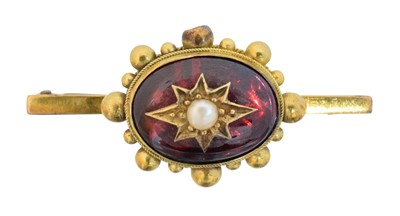Lot 29 - A foil-back garnet and split pearl brooch