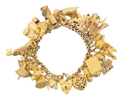 Lot 46 - A 9ct gold charm bracelet