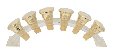 Lot 74 - Six Elizabeth II silver topped wine stoppers