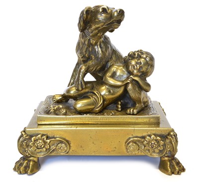 Lot 62 - Ormolu figure group of a dog protecting a child