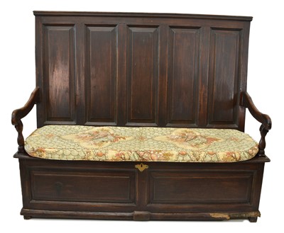 Lot 253 - George III oak box settle