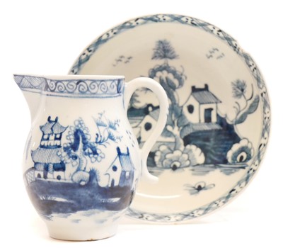 Lot 132 - Lowestoft cream jug and saucer