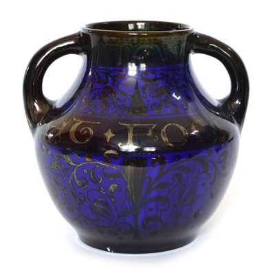 Lot 44 - Pilkington's Royal Lancastrian lustre twin handled vase