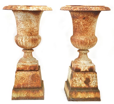 Lot 304 - Cast iron garden urns