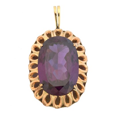 Lot 65 - A synthetic colour change sapphire pendant