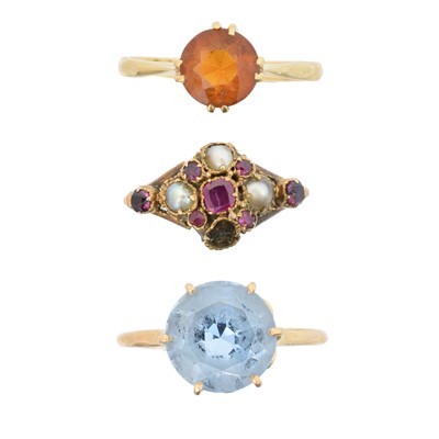 Lot 61 - Three gem-set dress rings