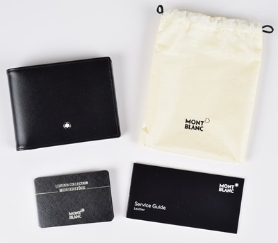 Lot 19 - A Montblanc Meisterstück leather wallet 6cc and lock and key set.