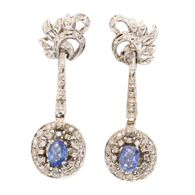 Lot 56 - A pair of sapphire and diamond earrings