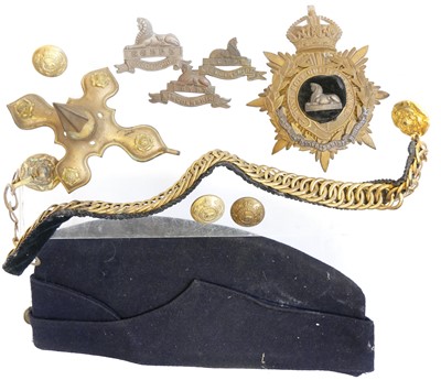 Lot 391 - The Lincolnshire Regiment Cloth helmet fittings and other uniform items