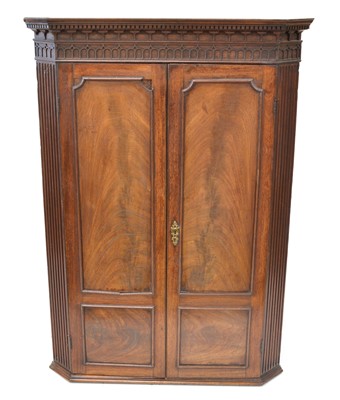 Lot 319 - George III corner cupboard