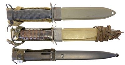 Lot 333 - Two USM8 fighting knives and scabbards, and a FAL type C bayonet and scabbard.