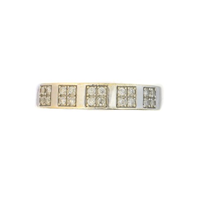 Lot 115 - An 18ct gold diamond band ring