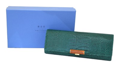 Lot 154 - A Smythson makeup brush roll