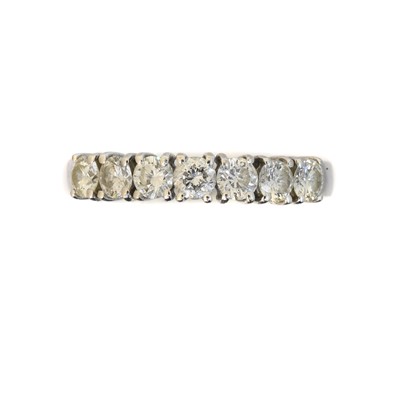 Lot 125 - An 18ct gold diamond seven stone ring