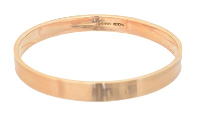 Lot 43 - A 9ct gold bangle