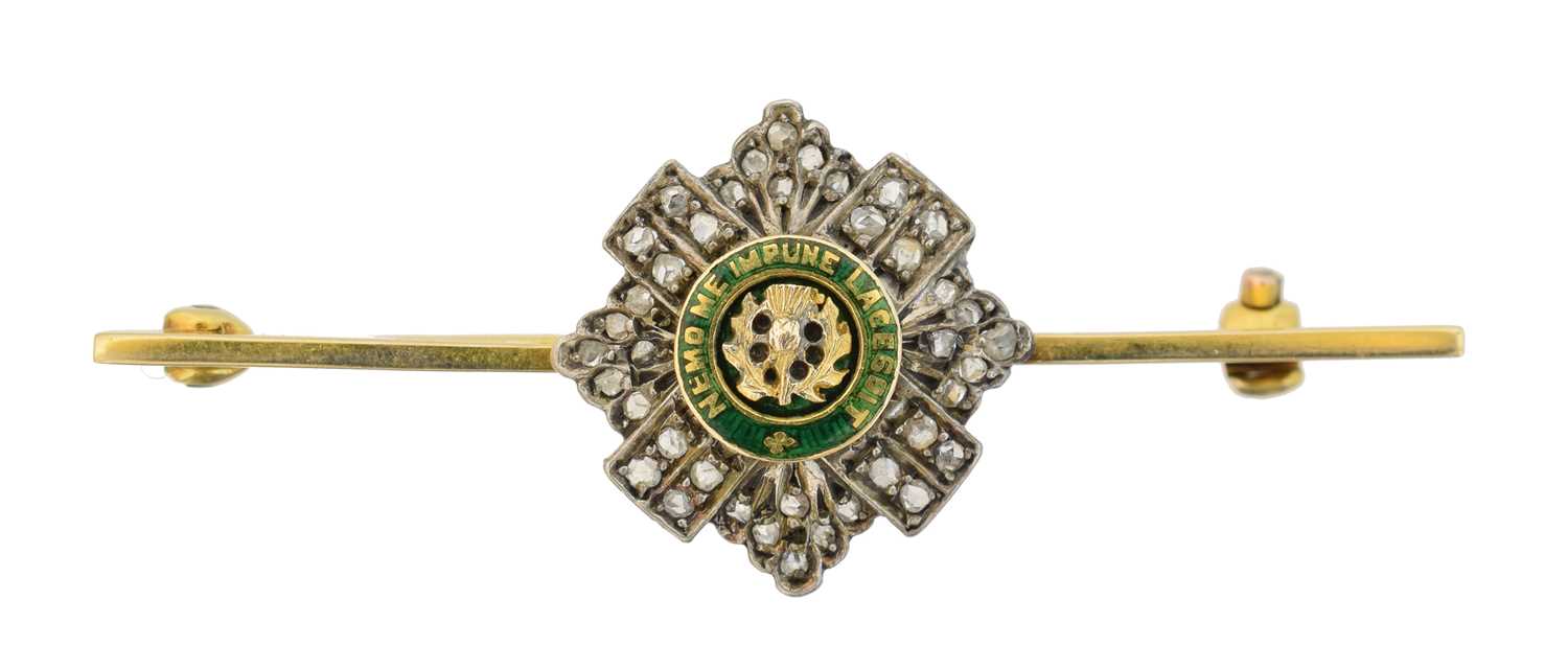 Lot 19 - A 9ct gold enamel and diamond sweetheart brooch by Garrard