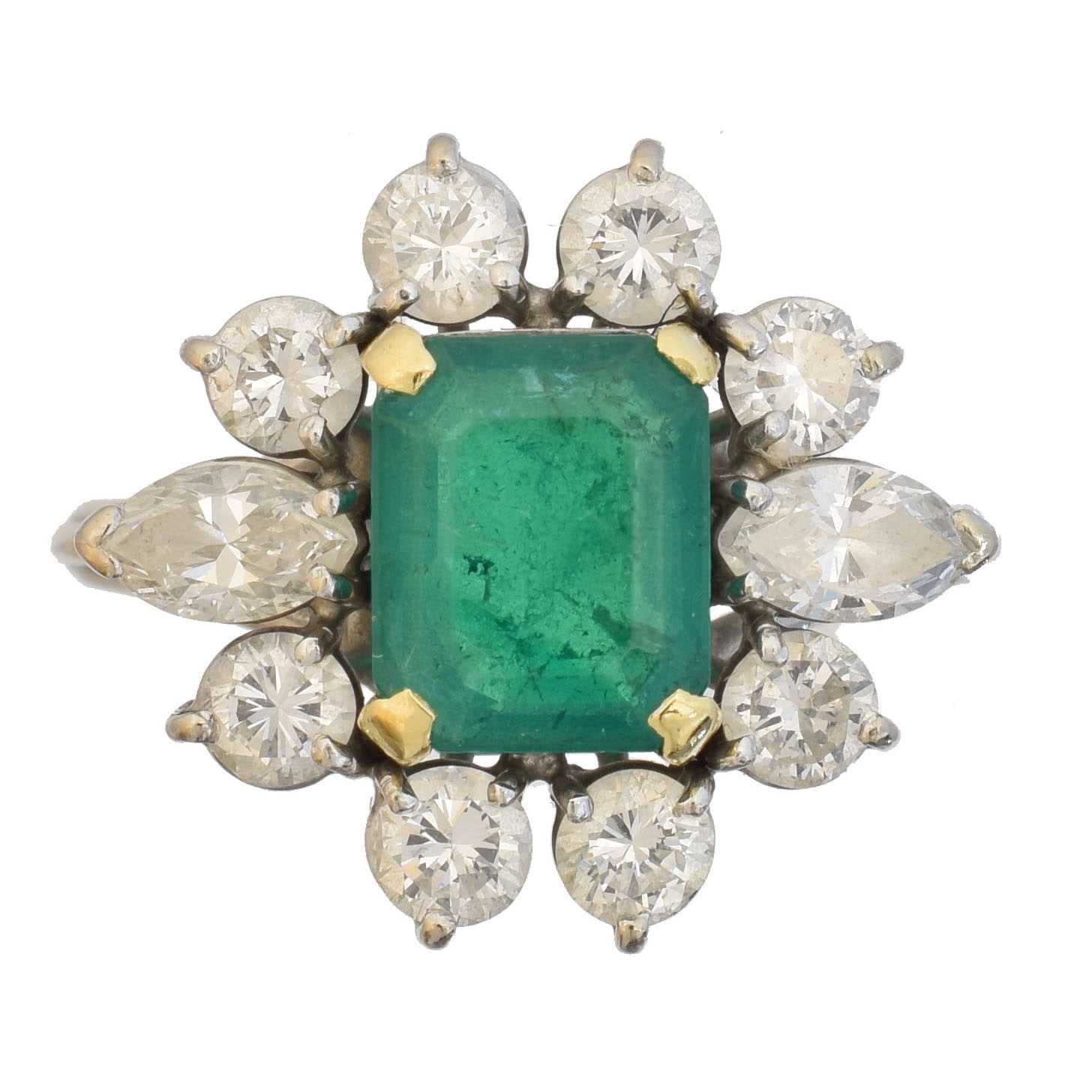 Lot 36 - An 18ct gold emerald and diamond cluster ring by Boodles & Dunthorne