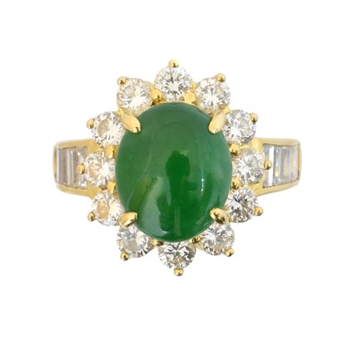 Lot 152 - A jade and diamond cluster ring