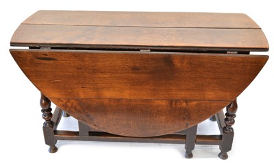 Lot 264 - 17th-century oak gate-leg table
