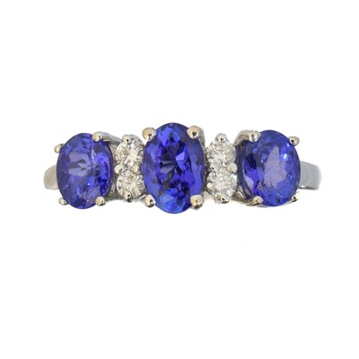 Lot 167 - An 18ct gold tanzanite and diamond dress ring