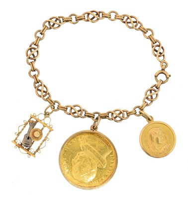 Lot 44 - A 9ct gold charm bracelet