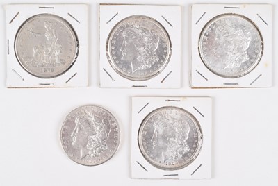 Lot 80 - Four silver US Morgan dollars and a US 1878 silver trade dollar (5).
