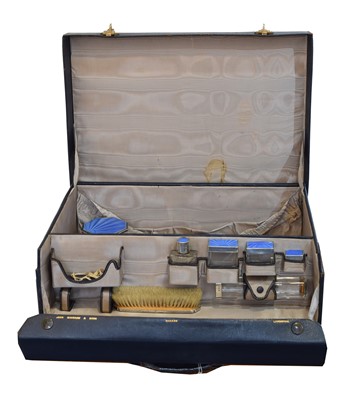 Lot 186 - A George V silver and enamelled dressing table set