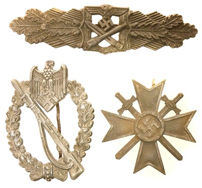 Lot 492 - Three German WWII badges