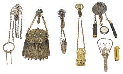 Lot 169 - A selection of white metal and base metal chatelaines