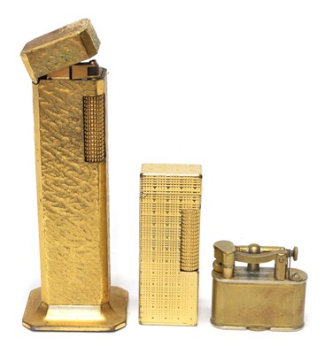 Lot 59 - Three Gilt metal Dunhill lighters