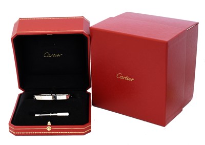 Lot 56 - An 18ct gold Cartier diamond 'love' bangle