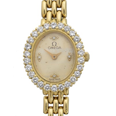 Lot 197 - A 1980s 18ct gold Omega quartz wristwatch, ref. 1450.