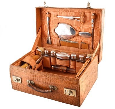 Lot 128 - An Edward VII silver travelling set