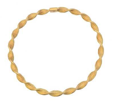 Lot 42 - A 9ct gold bangle by UnoAErre