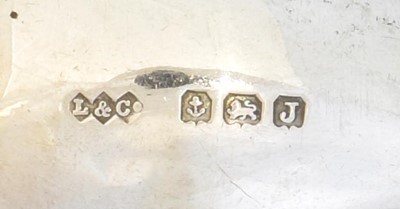 Lot 139 - A set of Liberty & Co silver coffee spoons