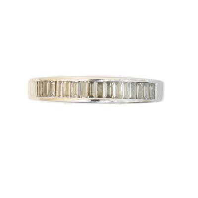 Lot 126 - An 18ct gold diamond band ring