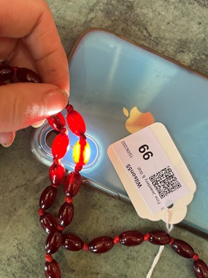 Lot 83 - A cherry bakelite necklace