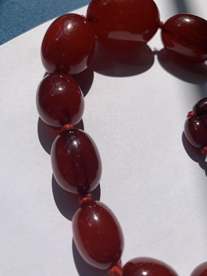 Lot 83 - A cherry bakelite necklace