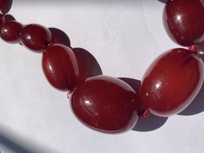 Lot 83 - A cherry bakelite necklace