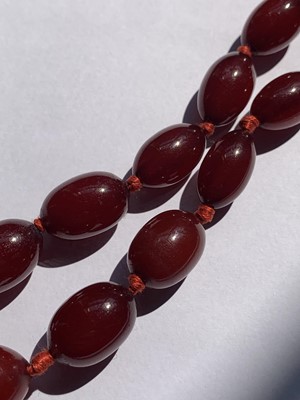 Lot 83 - A cherry bakelite necklace