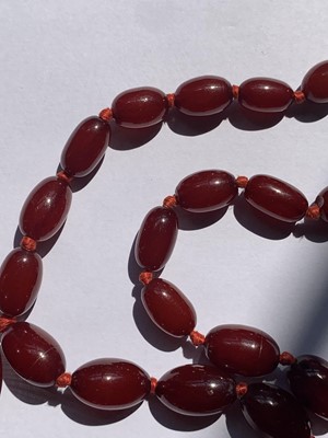 Lot 83 - A cherry bakelite necklace