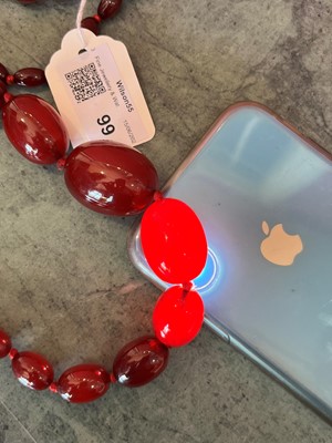 Lot 83 - A cherry bakelite necklace