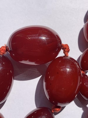 Lot 83 - A cherry bakelite necklace