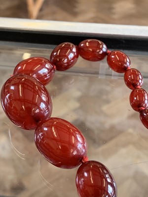 Lot 83 - A cherry bakelite necklace