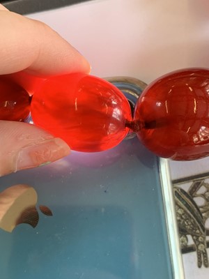Lot 83 - A cherry bakelite necklace