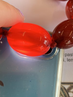 Lot 83 - A cherry bakelite necklace