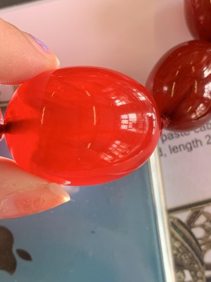Lot 83 - A cherry bakelite necklace